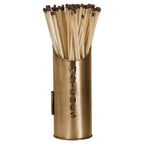 Tall bronze-toned match holder shown filled with long matches, with vertical MATCHES lettering and a panel mounted on its side.