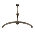 Front view of an antiqued-silver-tone garment hanger with a broad curved rail, raised HOTEL de PARIS lettering and a tall dome-capped hook.