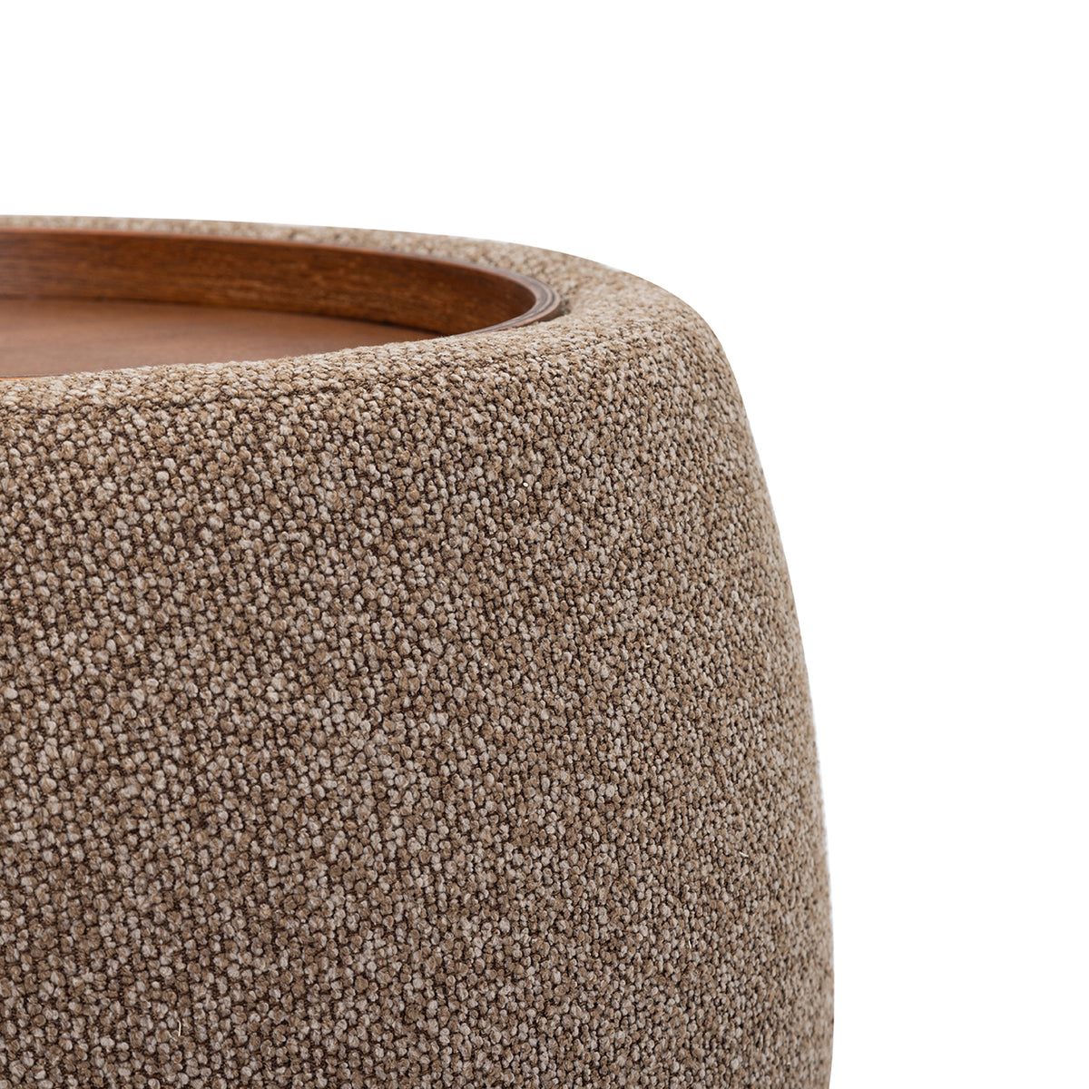 Close-up of the coffee-coloured chenille texture, curved upholstered rim and inset wooden tray edge.