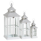 Three white rectangular lanterns shown in descending heights, with clear window panels, tiered roofs and pale loop handles.