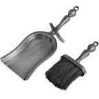 Hearth pan and brush shown separately on white, revealing the rounded pan rear, straight front edge and curved handle rest.