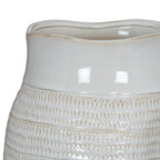Close-up of the vase's smooth white upper band above rows of loop impressions, with light reflecting on the glossy surface.