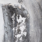 Close-up of the artwork's dark grey textured band, showing crackled-looking marks and irregular bright silver-toned patches.