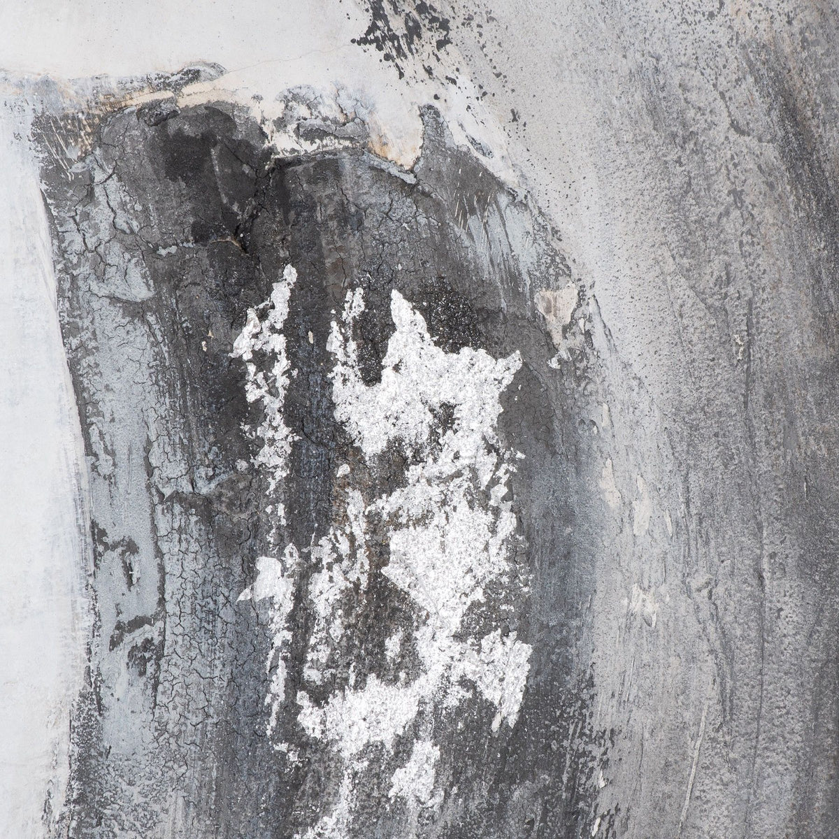 Close-up of the artwork's dark grey textured band, showing crackled-looking marks and irregular bright silver-toned patches.