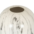 Close view of the vase's circular opening and curved shoulder, with fine grey trails and charcoal patches across the glossy off-white finish.
