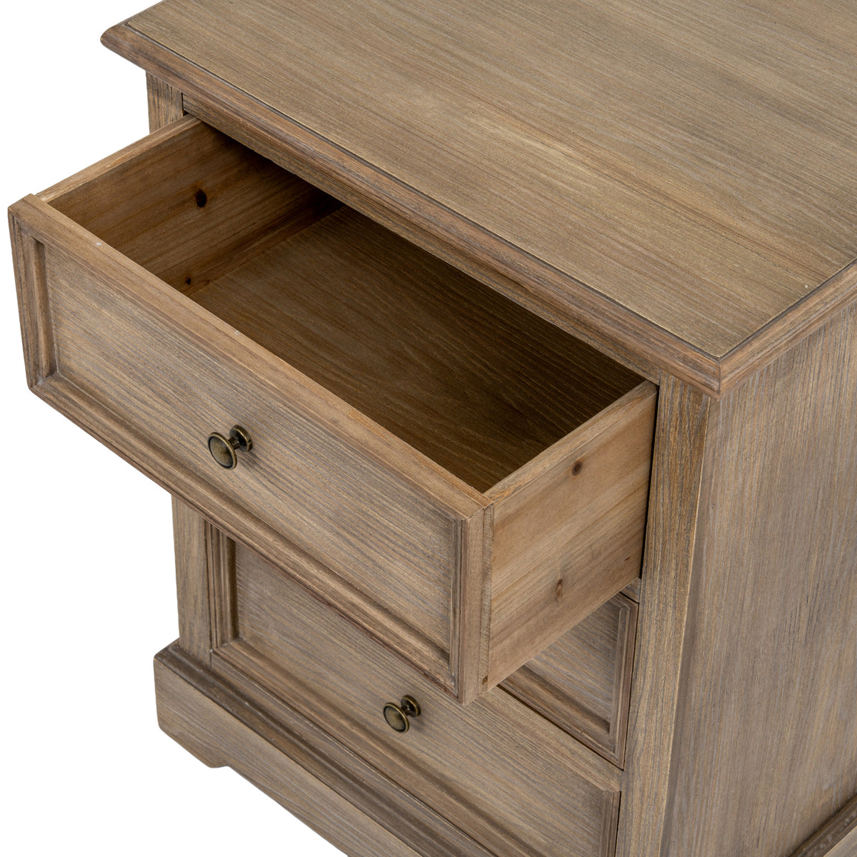 View from above of the chest with its top drawer open, showing the empty interior, framed front and round dark pull.