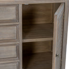 Right louvred cupboard door standing open to reveal the interior shelving beside the framed drawers.