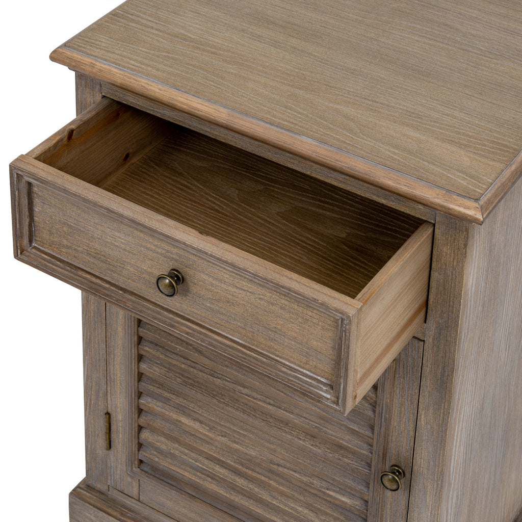 View from above of the open upper drawer, showing its empty interior, framed front and round pull.