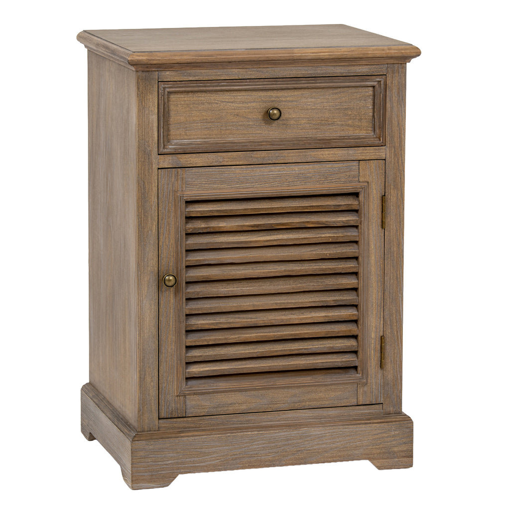 Three-quarter view of the brown wood-toned cabinet showing its left side, upper drawer and closed louvred door.
