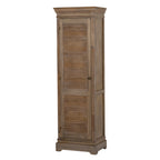 Tall brown-toned cabinet viewed at an angle, showing its closed louvred door, round dark pull and framed side.
