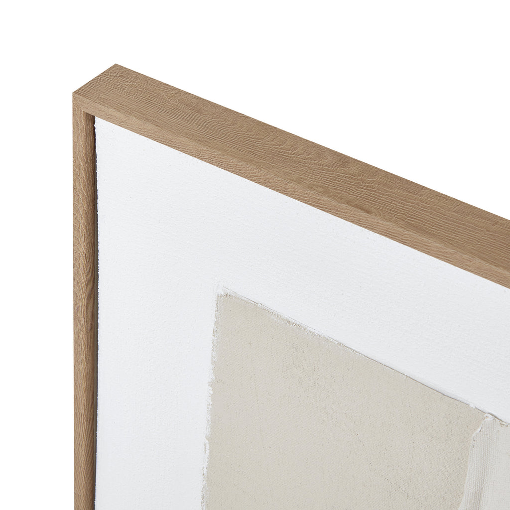 Close-up of the upper frame corner, showing its brown grain-like finish beside the white border and a textured cream shape.