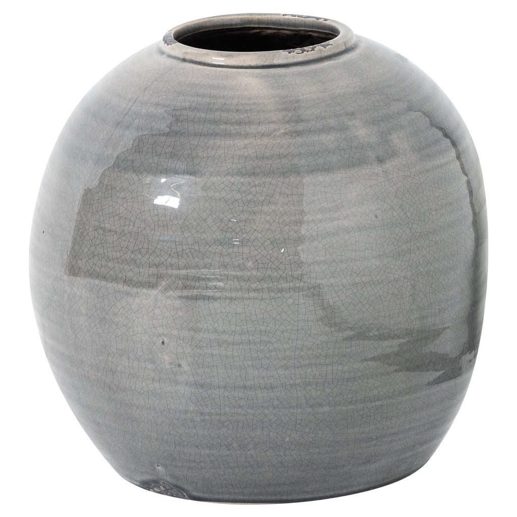 Grey rounded vase with a low circular opening, fine crackle pattern and dark patches at the rim and base, shown against white.