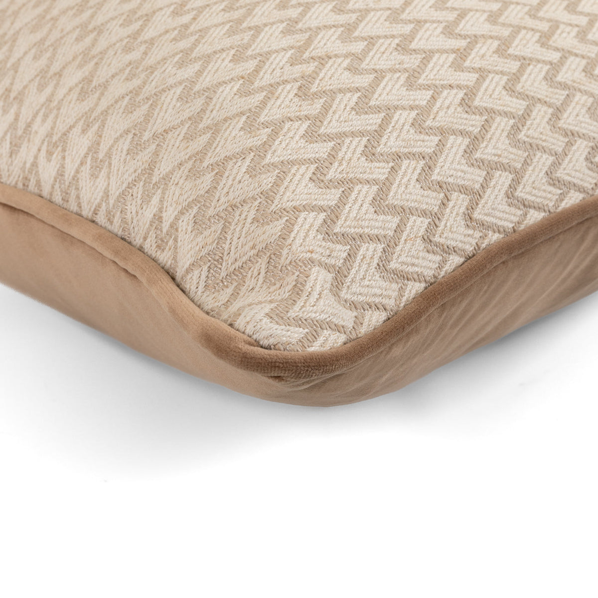 Close-up of the Marlo Cushion showing its neutral chevron weave and taupe velvet border
