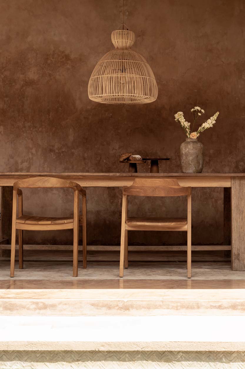 Matcha Whisk Rattan Pendant Light – Natural, Medium – styled above a dining table in a warm interior