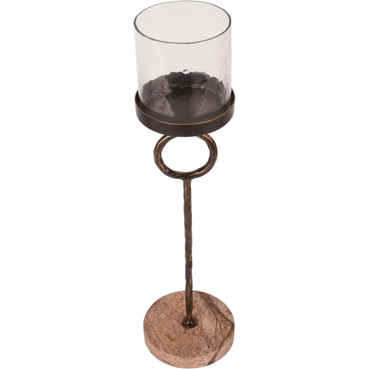 View from above showing the open glass cylinder, shallow metal cup and veined marble base of the candle holder.