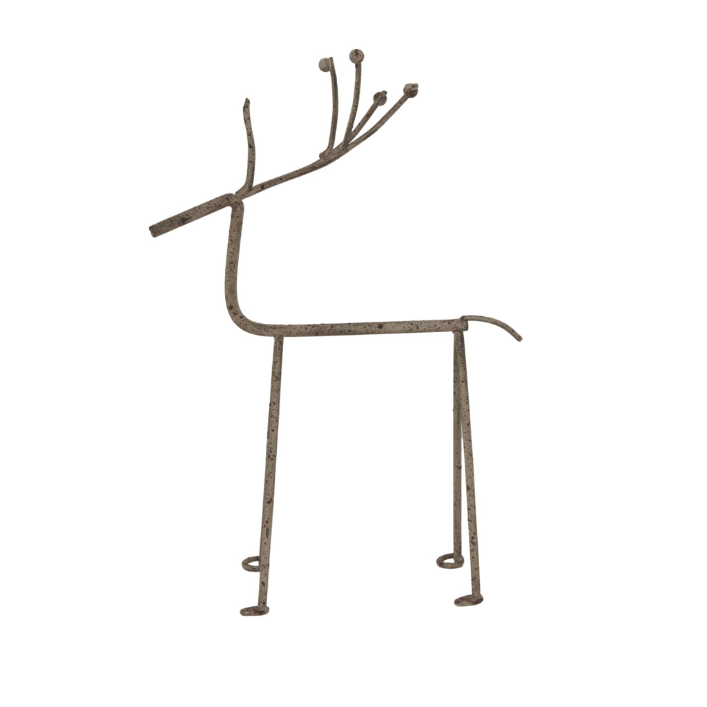 Side view of the minimalist grey reindeer decoration, with a long straight body, curved tail and dark mottling across its open outline.