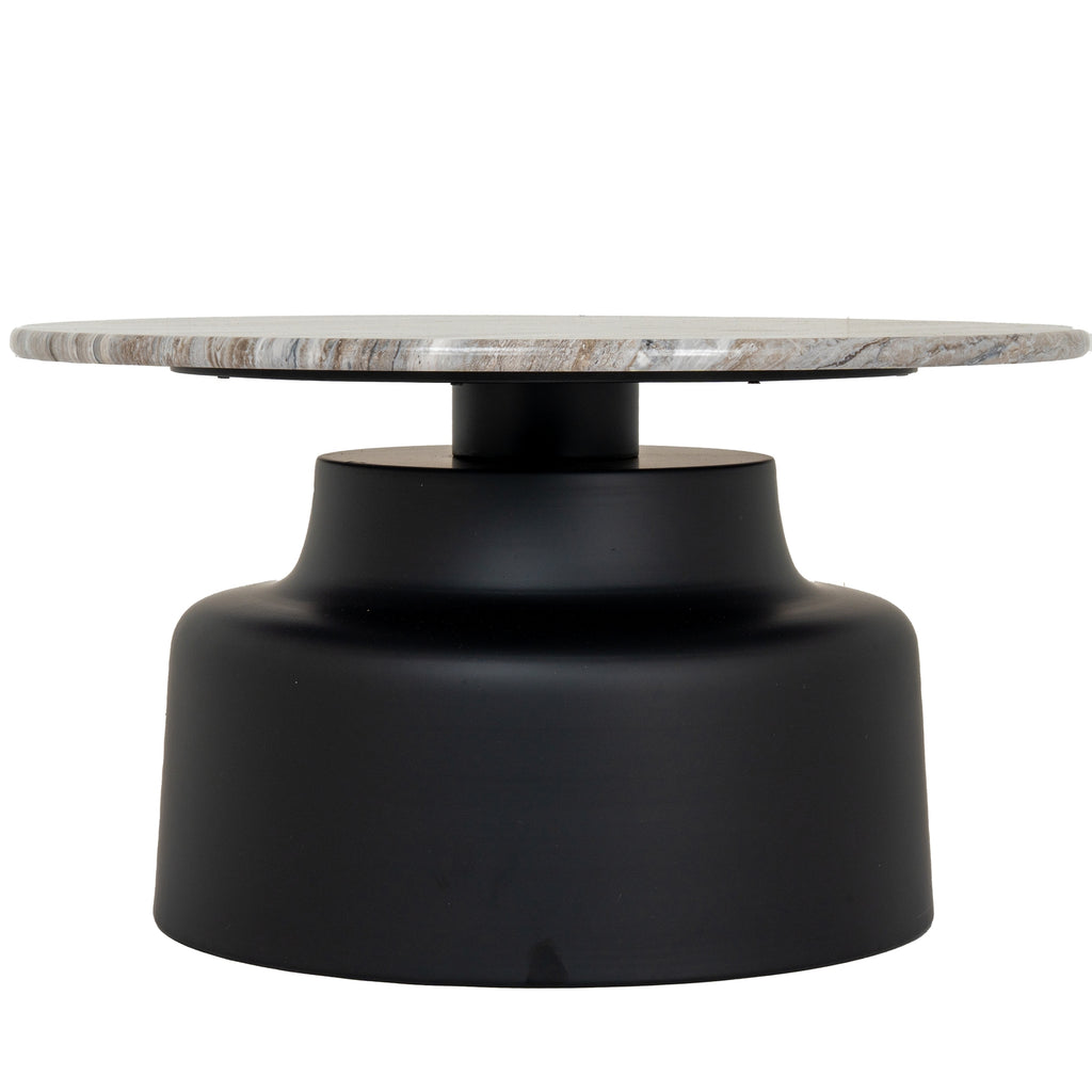 Front view of a round coffee table with a slim mottled top and a black pedestal that curves out to a broad base.