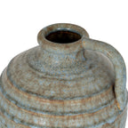 View down into the jug vase opening, showing the thick rolled lip, mottled shoulder and curved handle.