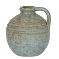 Round mottled jug vase with three raised shoulder bands, a rolled rim and a broad handle on the right.