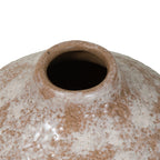Close-up of the vase opening and thick rounded rim, with ivory mottling and dark speckles across the brown neck and shoulders.