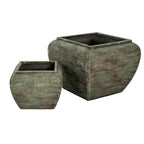 Two mottled planters in graduated sizes, with the smaller vessel in front of the larger one, showing square openings and rounded sides.