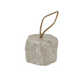 Mottled pale doorstop viewed from the front at an angle, with softly rounded corners and an upright twisted rope loop.