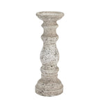 Full view of the pale mottled candle holder with rounded sections, narrow waists and a stepped circular foot against white.