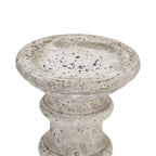 Close-up of the candle holder's broad shallow top recess, rounded rim and grey and charcoal markings.