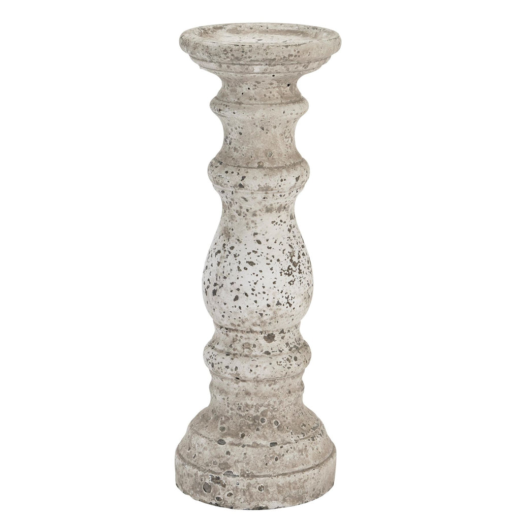 Pale mottled candle holder with a shallow round top, bulbous central section and stepped circular foot against a white background.