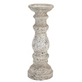Pale mottled candle holder with a shallow round top, bulbous central section and stepped circular foot against a white background.