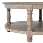 Close view of the coffee table's ringed leg profiles, curved apron and open lower shelf, showing pale grey tones across the brown grain.