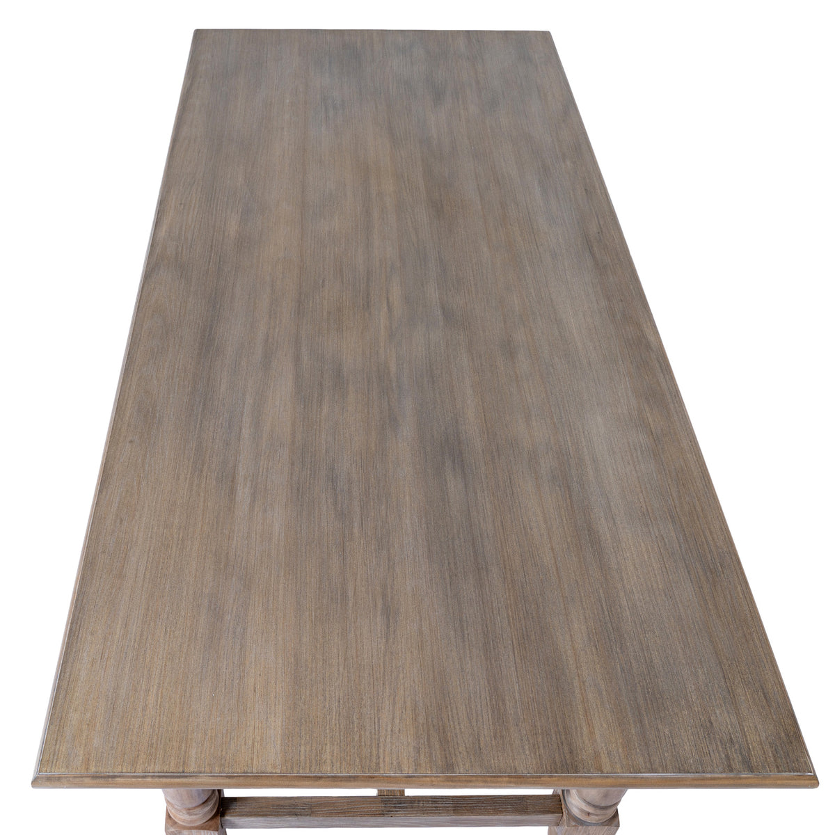 View from above along the rectangular tabletop, showing grey-brown grain and the narrow shaped border around its edge.