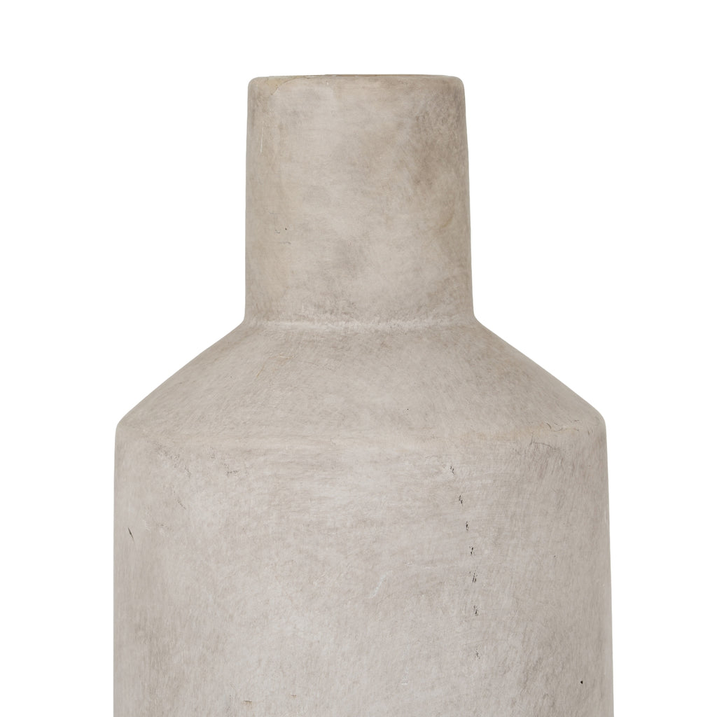 Close-up of the vase neck and shoulders showing pale beige-grey mottling, scattered dark flecks and fine irregular surface lines.