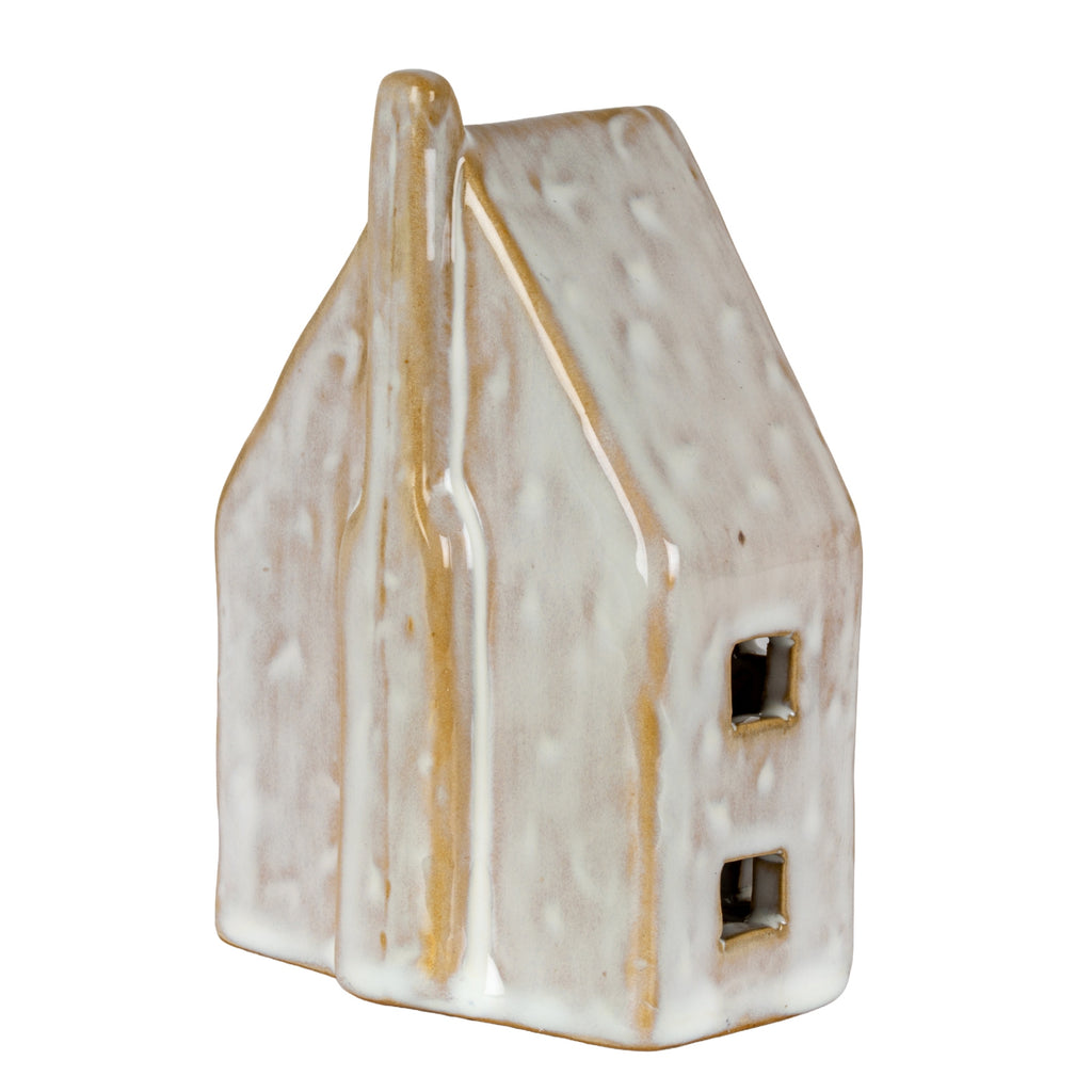 Rear angled view of the house decoration, showing the chimney extending down the plain gable wall and two open windows on the side.