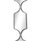 Close-up of a reflective panel showing the textured silver-toned border and curved waisted links above and below.