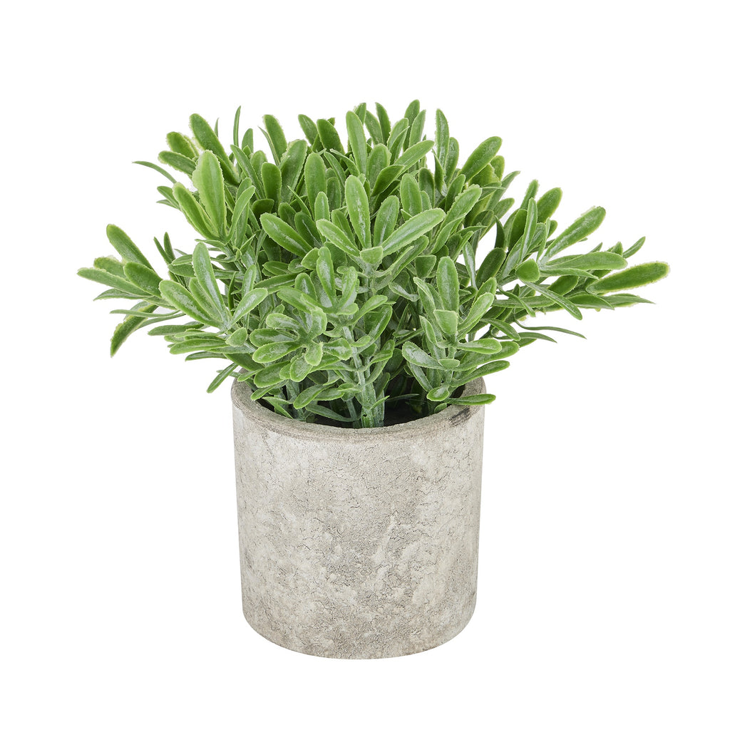 Artificial plant with dense elongated green leaves spreading above a cylindrical grey-beige stone-effect pot on a white background.