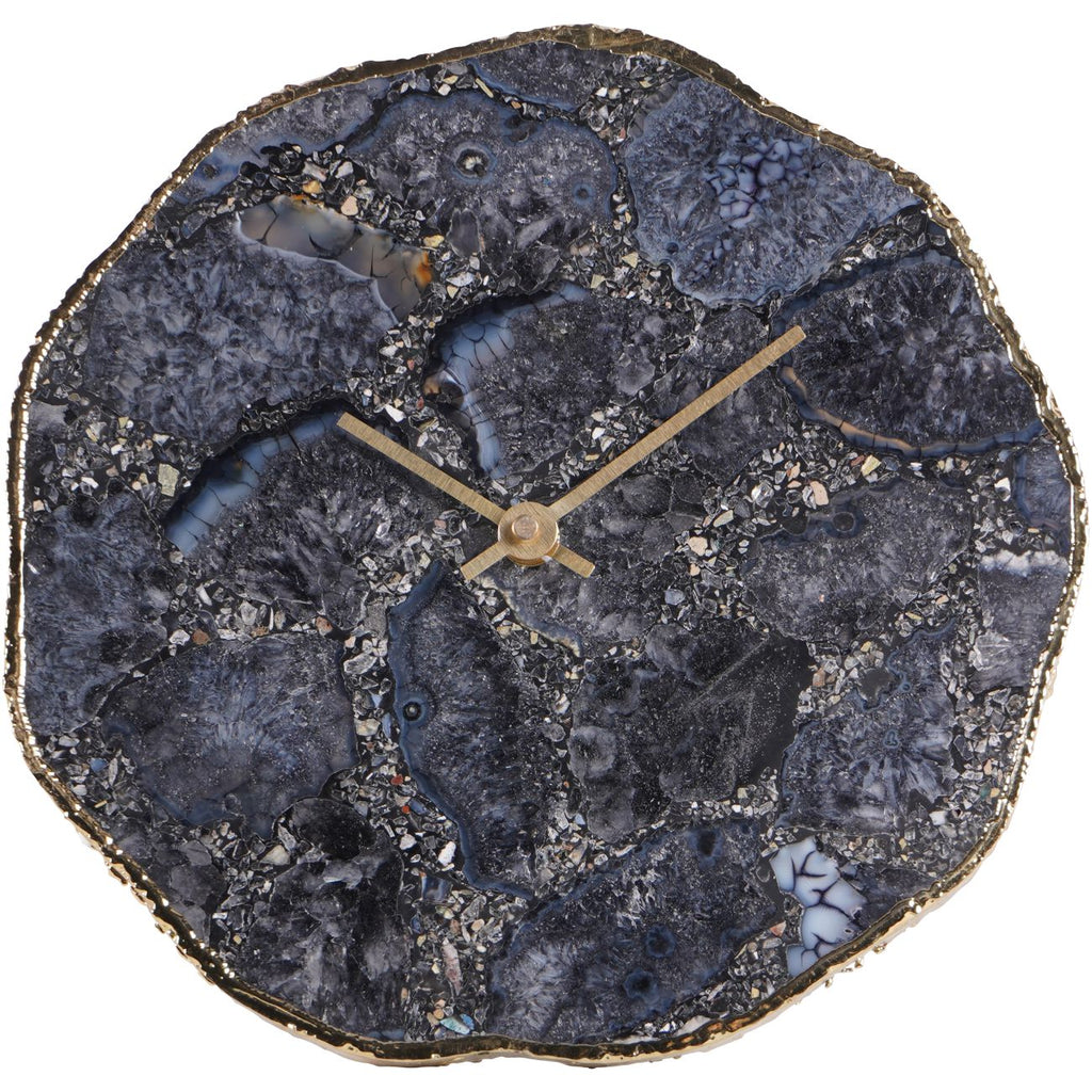 Front view of the mantel clock showing its dark patterned agate face, plain hands and uneven gold-coloured border.