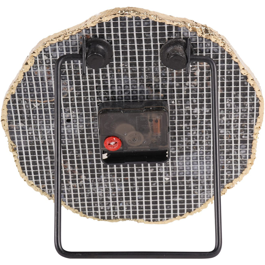 Rear view of the clock showing grid backing, central clock mechanism and rectangular black support.