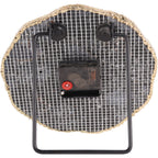 Rear view of the clock showing grid backing, central clock mechanism and rectangular black support.