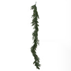 Green artificial garland hanging vertically against white, with a loop at the top and needle branches projecting along its length.