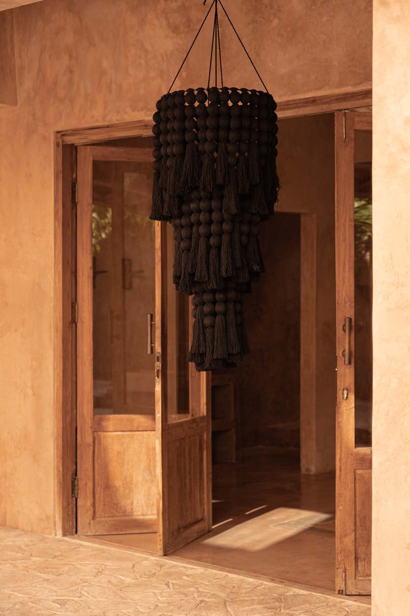 Nomad Cotton Chandelier – Black, Extra Large – styled in a timber doorway