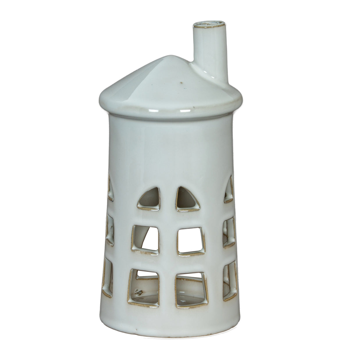 Front view of a white lighthouse tea light holder with three tiers of cut-out windows, a conical roof and an offset chimney.