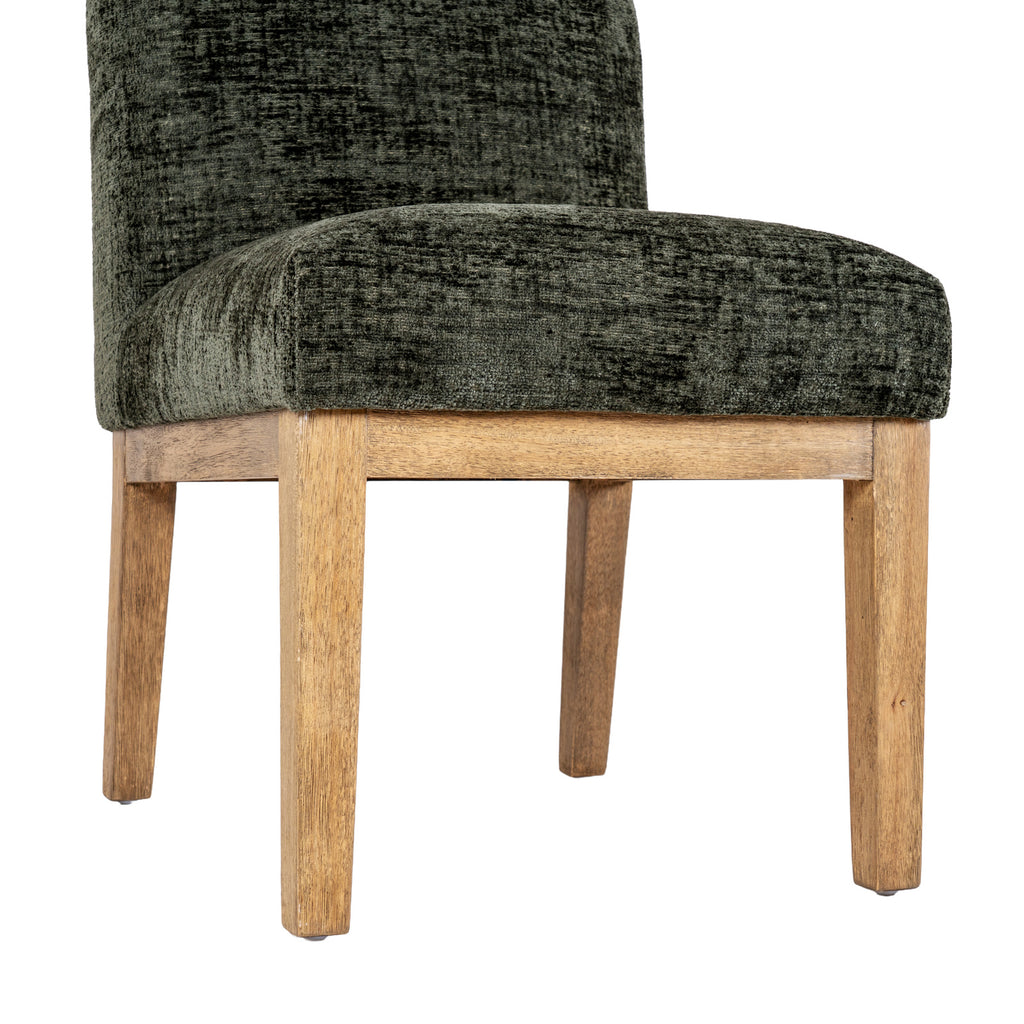 Low front angle of the chair showing the thick olive seat, brown rails and four legs with small dark foot pads.