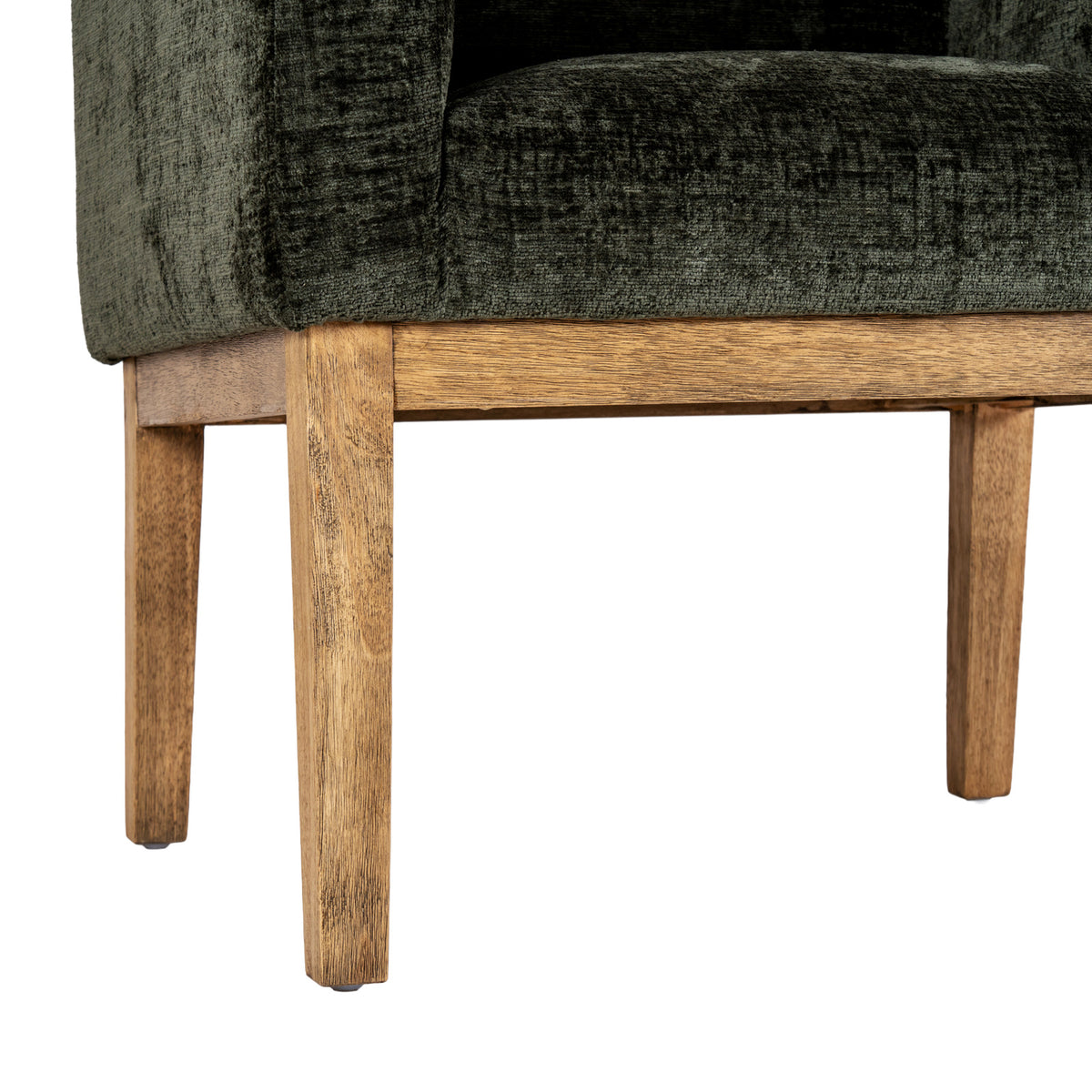Detail of the chair base with warm brown grained rails and tapered legs, small dark foot pads and olive upholstery above.