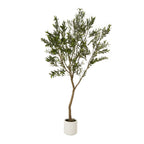Full view of the artificial tree with a slender brown trunk, high leafy crown and white cylindrical pot.