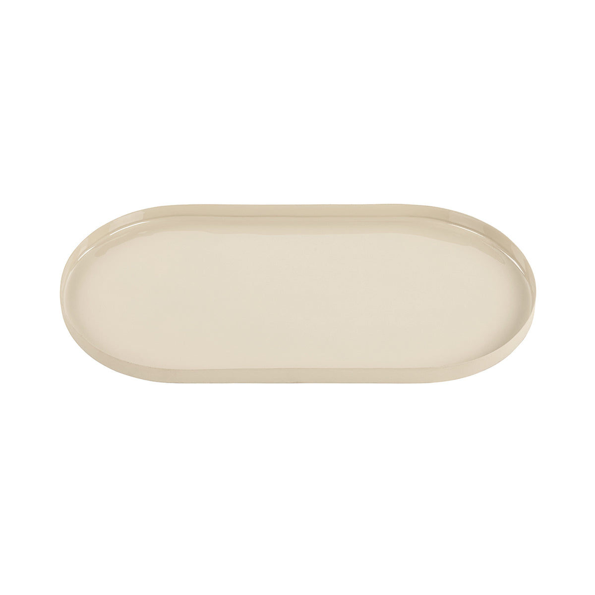 Cream tray viewed from above at a slight angle, showing its elongated shape and shallow interior.