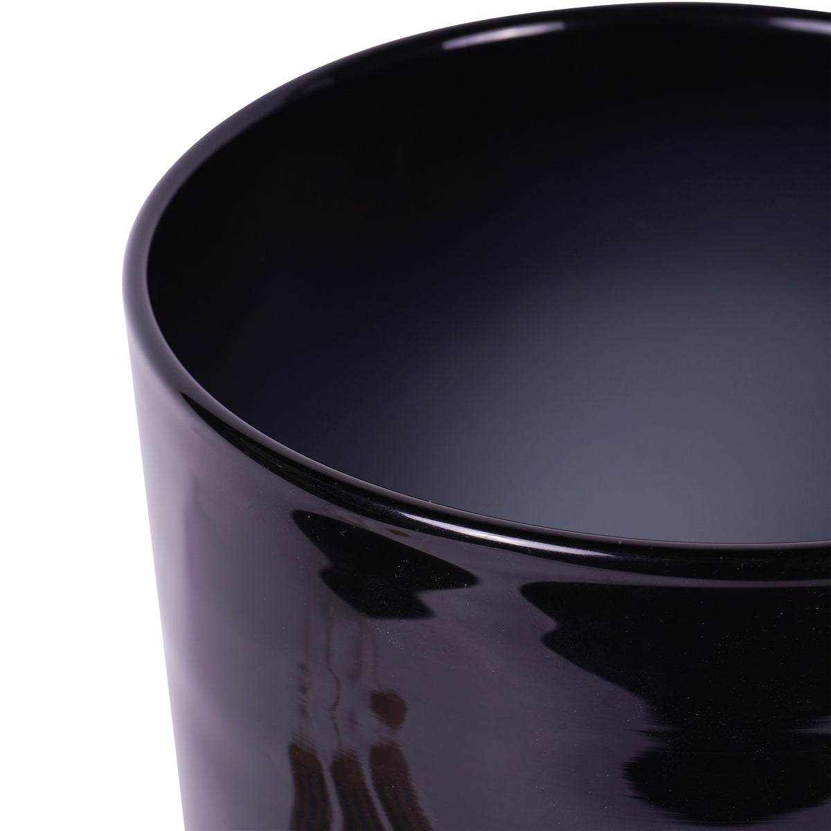 Close-up of the hurricane vase's circular black glass rim, dark interior and glossy outer surface.