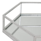 Angled detail of the tray's open upper rail and reflective base, showing the hexagonal corner and reflections of the silver-toned frame.