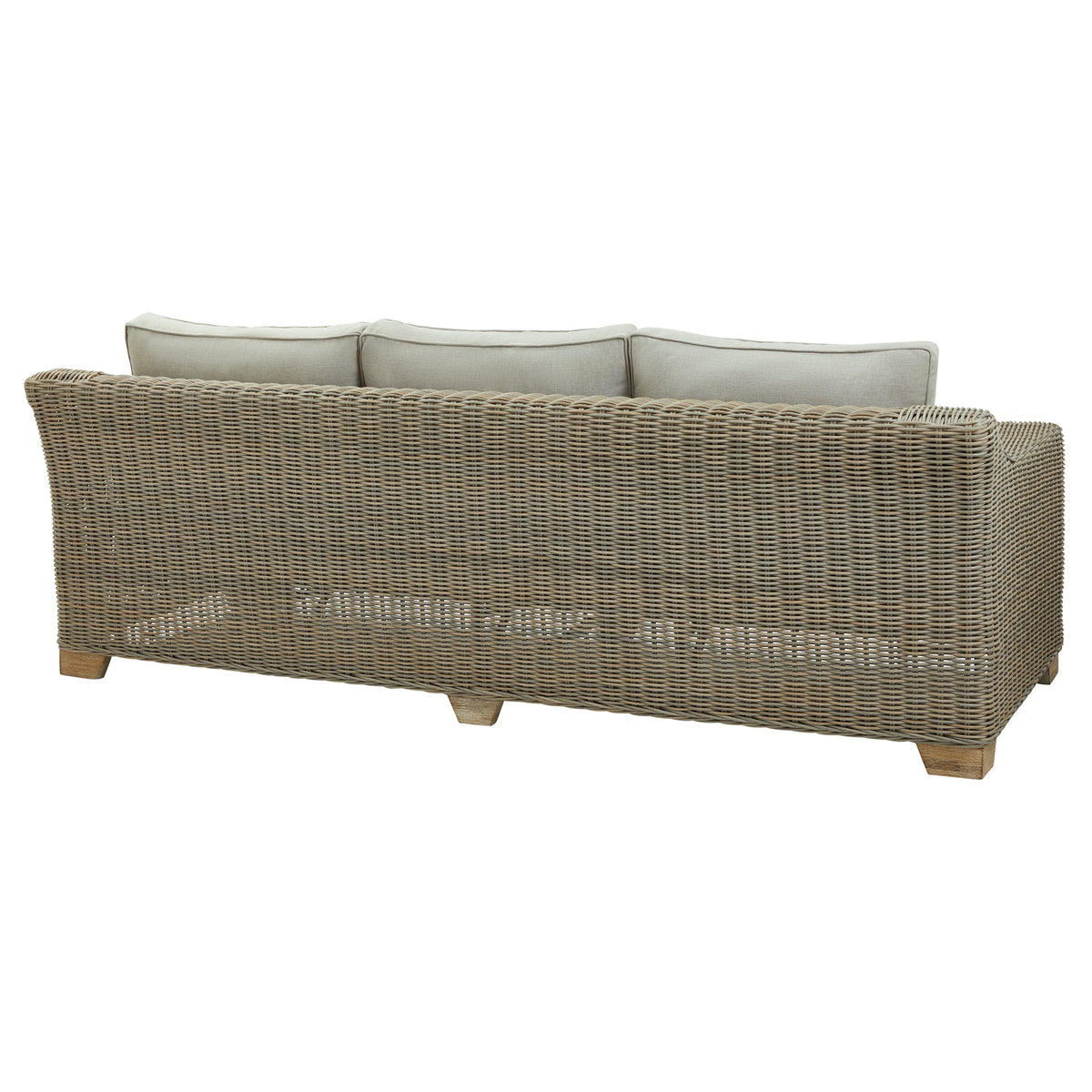 Rear angled view of the sofa showing the grey weave pattern across its rounded back, pale cushions above and short feet below.