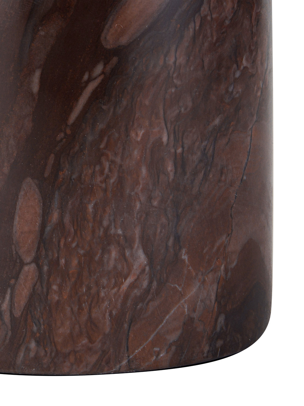 Close-up of the candle holder's cylindrical marble base, showing mottled red markings and fine pale and dark veins.